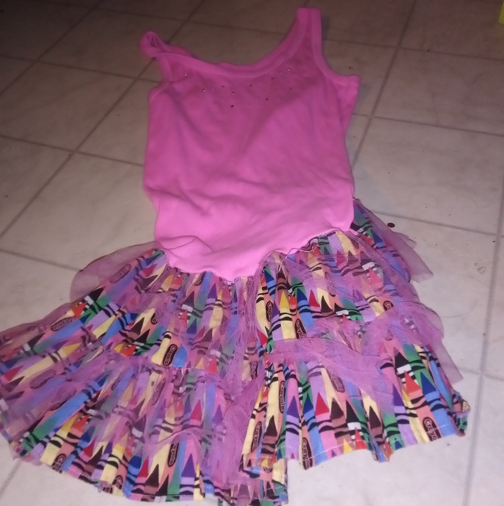Pink top with little diamonds and a crayon skirt